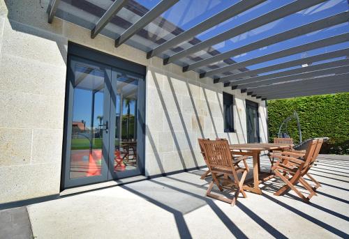 Φωτογραφία από το άλμπουμ του Chalet de playa con piscina en As Sinas σε Villanueva de Arosa