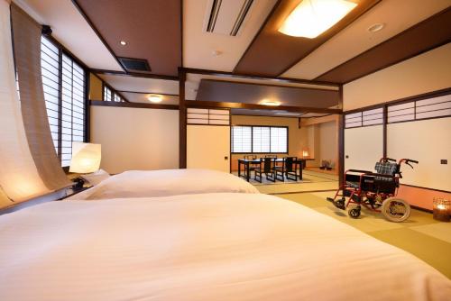 Tofuya Ryokan, Onogawa Onsen, Sauna, Barrier-freeにあるベッド
