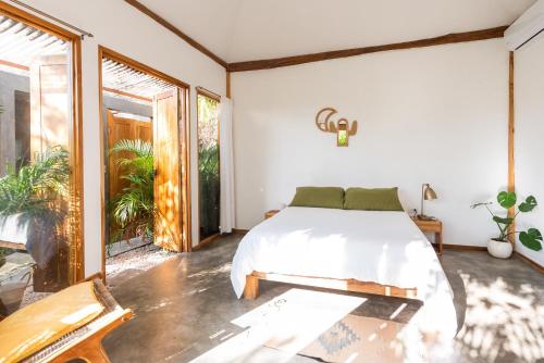 Una cama o camas en una habitación de Lucero