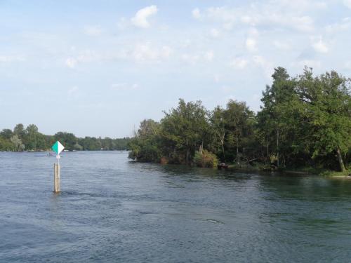 a sign in the middle of a body of water at Ferienwohnung am Sonnenberg in Busingen am Hochrhein