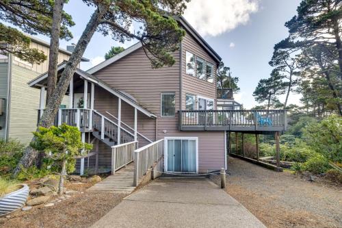 a house with a staircase and a balcony at Coastal Tillamook Vacation Rental Ocean Views! in Tillamook