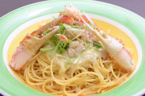 a plate of pasta with shrimp and other foods at Hotel Excel Okayama in Okayama