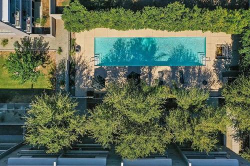 an overhead view of trees in front of a building at Tempe Lofty Studios in Tempe