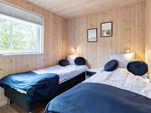 Postel nebo postele na pokoji v ubytování Holiday home Blåvand