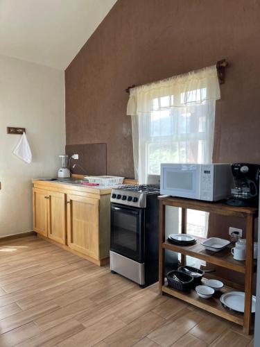 Kuchyň nebo kuchyňský kout v ubytování Floresta Casa de Campo