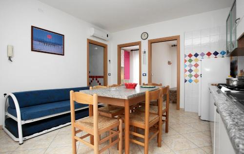 Kuchyň nebo kuchyňský kout v ubytování Residence La Pigna