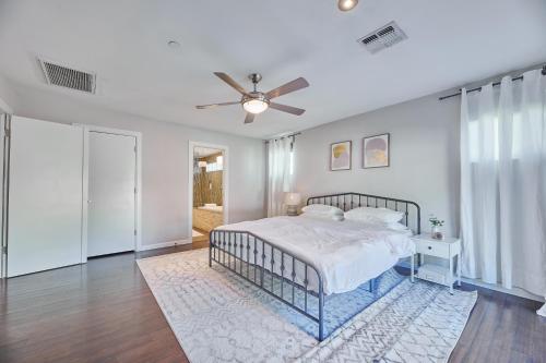 a bedroom with a bed and a ceiling fan at Amazing Location! Old Town Scottsdale Modern Home in Scottsdale