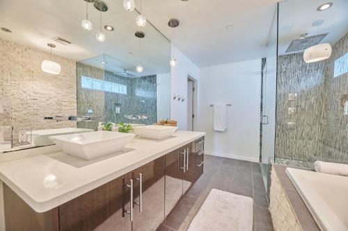 a bathroom with two sinks and a shower at Amazing Location! Old Town Scottsdale Modern Home in Scottsdale