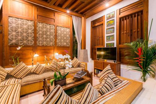 Χώρος καθιστικού στο Villa Kampung Kecil Boutique Hotel