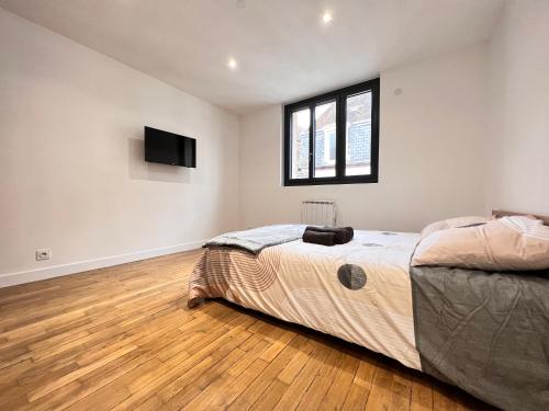 Photo de la galerie de l'établissement SENS - Appartement Proche Gare et Centre ville - WIFI FIBRE - Check in AUTONOME - Bel Espace de vie - Smart TV, à Sens