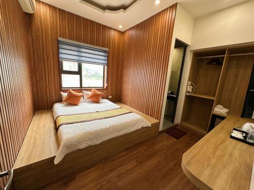 Giường trong phòng chung tại Minh Hoang Hotel & Homestay