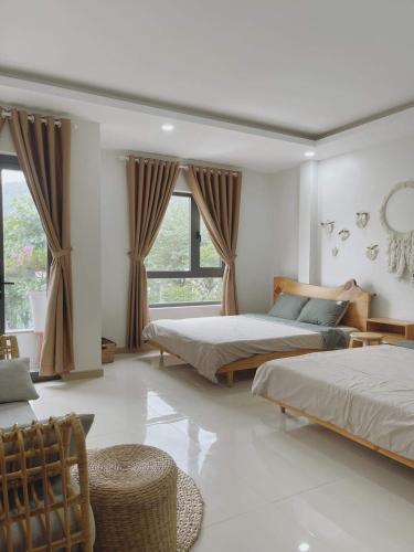 Postel nebo postele na pokoji v ubytování À Ơi Home - Venuestay