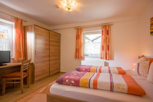 A bed or beds in a room at Mountainpeak