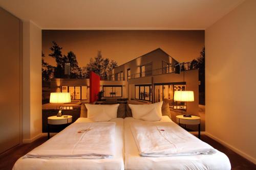 En eller flere senge i et værelse på Landhotel zum Böhm