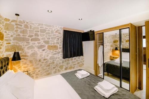 Кровать или кровати в номере Alonion Apartments