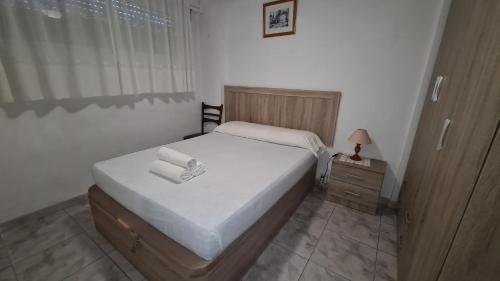 Postel nebo postele na pokoji v ubytování Apartamento Edificio Acacias I -3