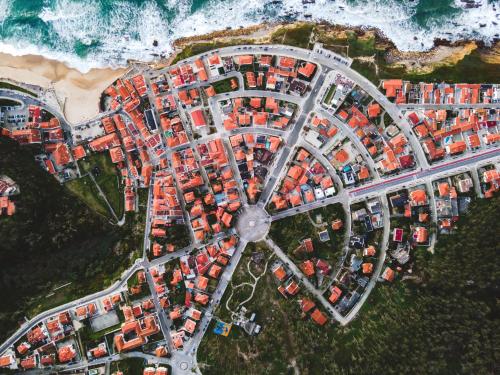 an overhead view of a city with red buildings at Hotel Mar e Sol & Spa in São Pedro de Moel