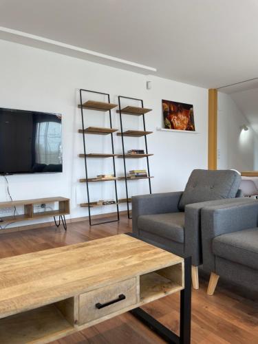 a living room with a couch and a coffee table at Casa para 8 personas en Berga - ALBERGA in Berga