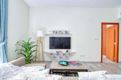 TV a/nebo společenská místnost v ubytování The Smart Concierge - Greens