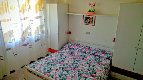 Ένα ή περισσότερα κρεβάτια σε δωμάτιο στο Villa Andromeda