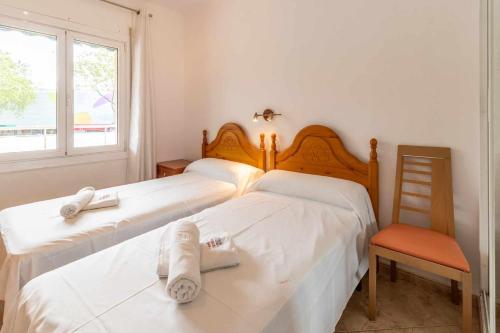 Posteľ alebo postele v izbe v ubytovaní Les Algues Encantador apartamento en el centro