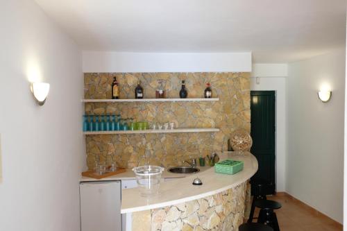 Η κουζίνα ή μικρή κουζίνα στο Praia Verde 130
