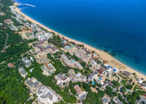 an aerial view of a resort on a beach at Prestige Deluxe Hotel Aquapark Club - All inclusive in Golden Sands