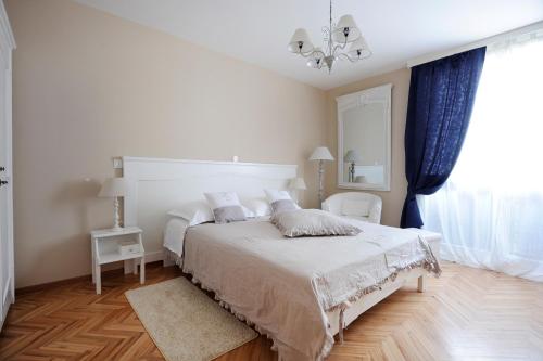 Posteľ alebo postele v izbe v ubytovaní Tinel Rooms Old City Center