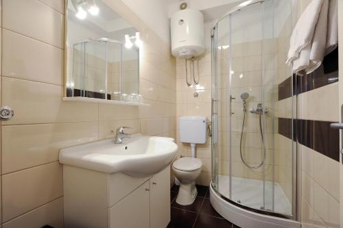 Kúpeľňa v ubytovaní Tinel Rooms Old City Center
