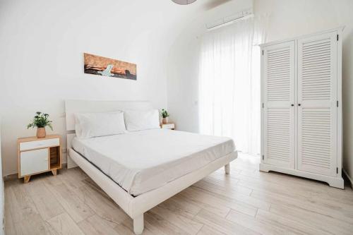 A bed or beds in a room at White Amalfi Centro Storico by ItalianHost