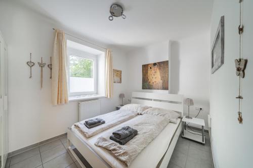 Posteľ alebo postele v izbe v ubytovaní Modernes Appartement nahe U-Bahn und Schönbrunn