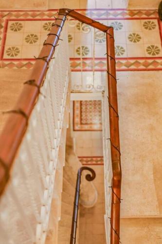 a view of a staircase in a room at Sliema Unique 4 Bedroom Townhouse Off The Beach in Sliema