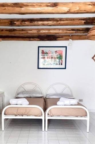 Ένα ή περισσότερα κρεβάτια σε δωμάτιο στο Casa nostra - Panarea