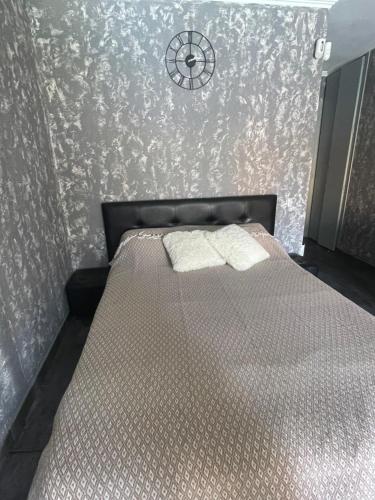 מיטה או מיטות בחדר ב-Estudio Loft