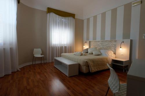 Postel nebo postele na pokoji v ubytování Hotel Sant'Elia