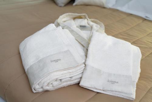 Postel nebo postele na pokoji v ubytování Hotel Sant'Elia