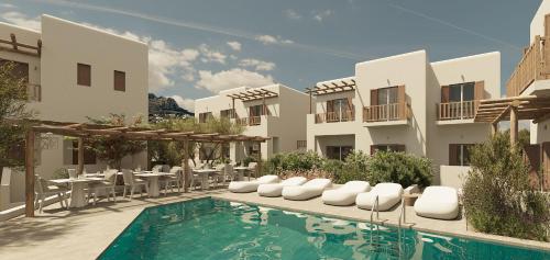 a hotel with a swimming pool and tables and chairs at Mykonaki Hotel in Ano Mera