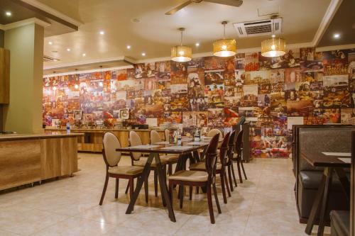 Restaurant ou autre lieu de restauration dans l'établissement CBD Hotel
