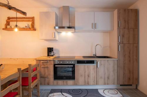 Kuchyň nebo kuchyňský kout v ubytování Chalet Novablick