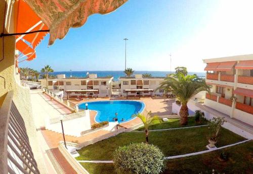The swimming pool at or close to Vera Mar 9C - Primera linea con Parking y TV Sat