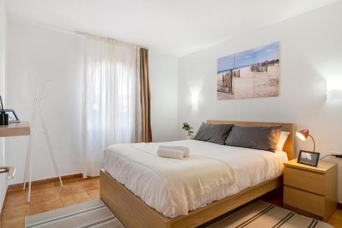 Posteľ alebo postele v izbe v ubytovaní Casa Las Palmeras