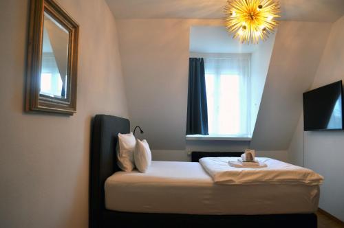 Postel nebo postele na pokoji v ubytování Guesthouse fürDich