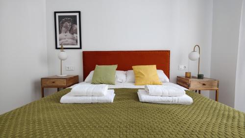 PANORAMIC design home tesisinde bir odada yatak veya yataklar