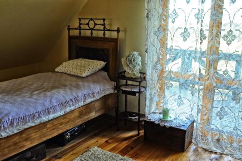 Posteľ alebo postele v izbe v ubytovaní DOMEK LUBENIA