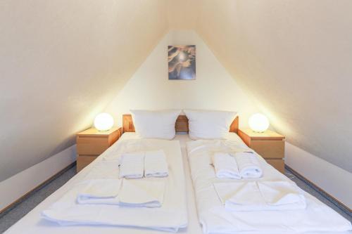 Postel nebo postele na pokoji v ubytování Appartement Wellenreiter