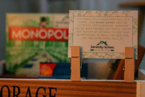 a wooden box with a sign on top of it at Serenity Suites: Your tranquil gateway! in Biñan