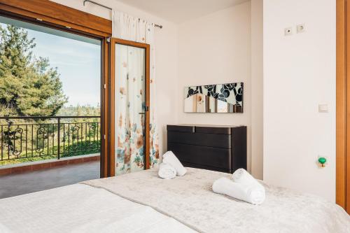 A bed or beds in a room at Private pool villa