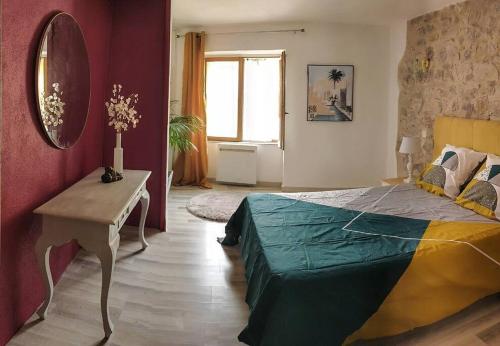Posteľ alebo postele v izbe v ubytovaní Maison de village avec terrasse