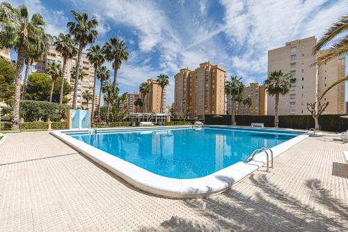 Apartamento con piscina y parking - Playa San Juan