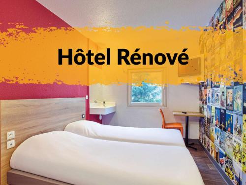 hotelF1 Lyon Solaizeにあるベッド
